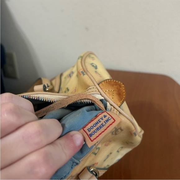 Dooney & Bourke
Cream Tan Shoulder
Bag Leather Trim Coated
Monogram Rainbow - Picture 8 of 10